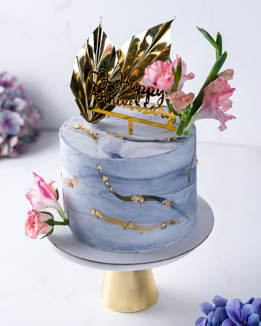 Celebrate in Style: Our Elegant Grey Marble Cake for Anniversaries