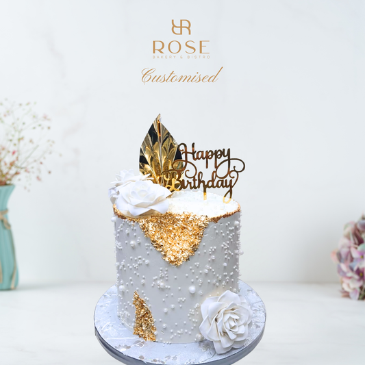 White roses and palm cake