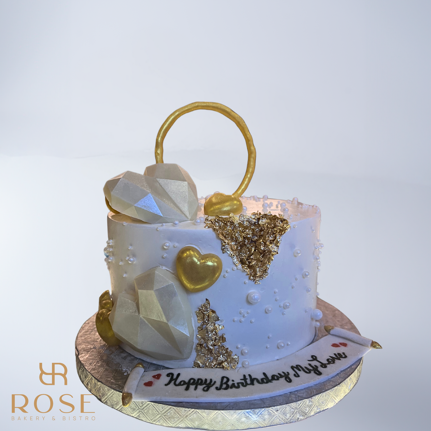 White and gold heart cake